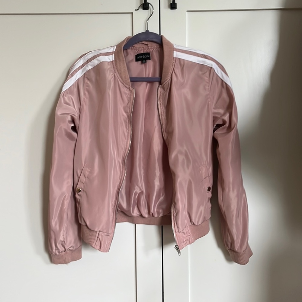 Light pink light weight jacket.